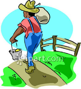 Farmer walking down a dirt road free clipart picture